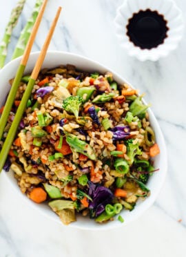 Vegetable fried rice made with extra veggies and brown rice, for health and flavor bonus points! Get the recipe at cookieandkate.com